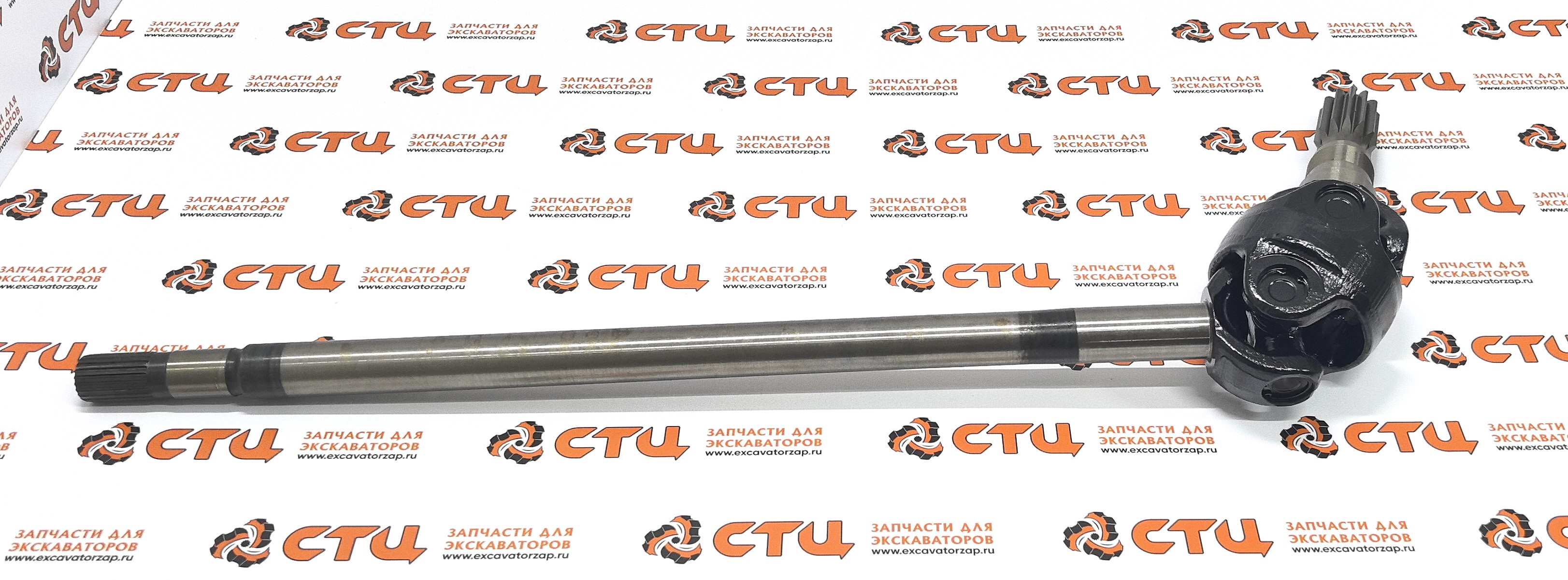 Полуось в сборе 84316954 (84258436 + 310644 + 84258439 + 84258437 + 84316955, аналог, Турция) переднего моста экскаватора погрузчика NEW HOLLAND B110